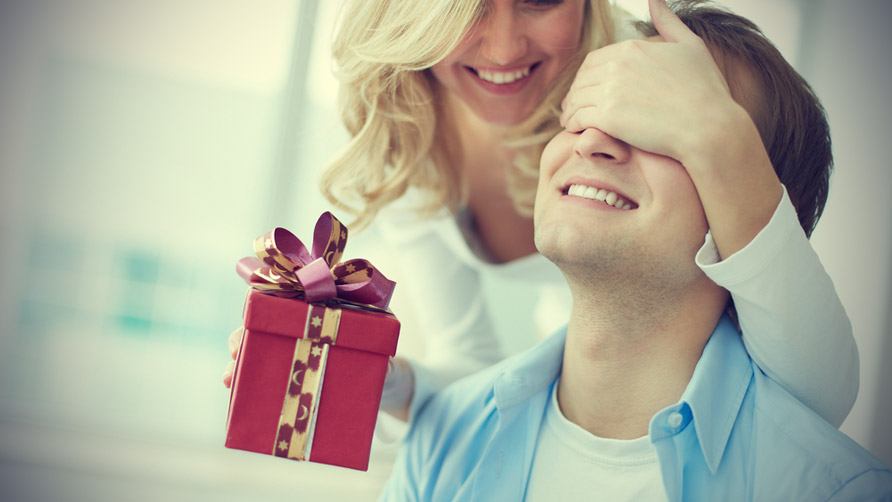 woman-surprising-her-man-with-a-gift
