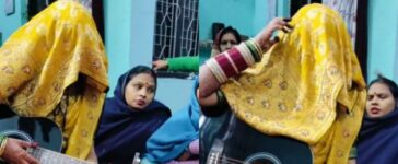 Bride Playing Guitar In Ghoonghat