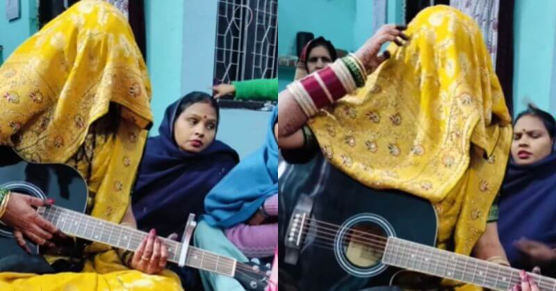 Bride Playing Guitar In Ghoonghat
