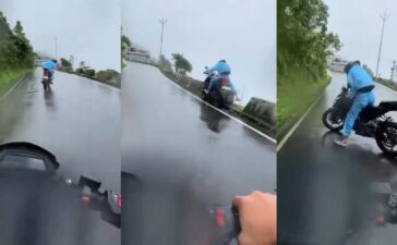 Biker Loses Control Slippery Hill Road Video