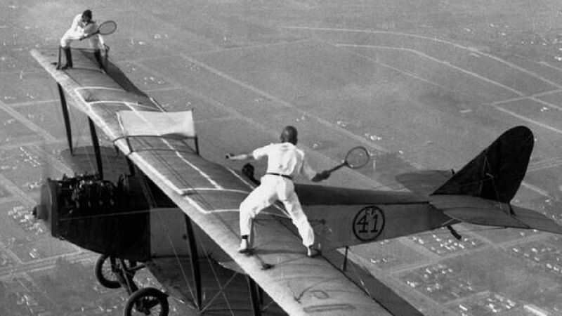playing tennis on a moving airplane